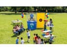 Blue and yellow dunk tank rental in Houston with colorful balloons, ideal for interactive party entertainment in Cypress.