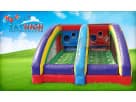 Football-themed dual-lane bounce house rental in Austin with dual slides and scoring panels, ideal for Georgetown parties.