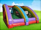 Quarterback Blitz Football interactive rental in Austin with dual slides—ideal for Buda birthday parties.