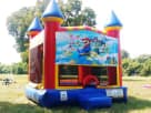 Mario Bros inflatable bounce house en renta en Austin con diseño de castillo 13x13, ideal para fiestas en Round Rock.