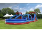 140ft U-Turn Rugged Warriors obstacle course rental in Austin with dual slides and climbing walls, ideal for Kyle events.