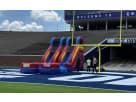 Red and blue dual lane water slide rental set up for a Dallas party, ideal for McKinney events with competitive racing fun.