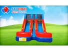 Dual lane water slide rental in Houston with 15ft climbing wall, ideal for Pasadena summer parties.
