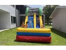 Colorful 15ft water slide rental in Austin with attached splash pool — ideal for Leander birthday parties and family events.
