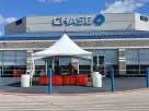 15x15 high peak tent rental in Houston with red bench seating, ideal for The Woodlands outdoor events and small weddings.