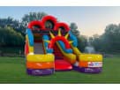 Colorful dual-slide water bounce house rental in Houston with 16ft height, ideal for Pasadena backyard parties.