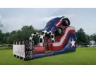 Perfect for Austin parties, this 18ft Patriot Monster Truck water slide rental features red, white, and blue race car design