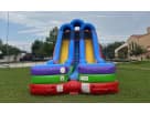 18ft Retro Double water slide rental in Dallas with wet or dry options, colorful base panels set up in residential yard.