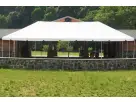 20ft x 40ft frame tent rental in Houston with clear sides and steel support poles, ideal for League City weddings and events