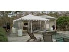 20ft x 20ft frame tent rental in Houston with clear side panels, ideal for Pearland backyard parties accommodating up to 66