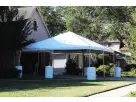 20x20 frame tent rental in Houston with capacity for 66 guests, ideal for The Woodlands outdoor events and backyard parties.