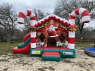 Renta de Christmas Candy Cane Bounce House con tobogán en Dallas, ideal para fiestas navideñas en McKinney.