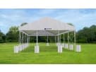 Large white frame tent rental in Houston ideal for drive-through events, seats up to 100 guests, set up on a grassy field.