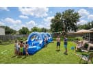 Tobogán acuático de 32ft en renta en Houston, ideal para fiestas en Spring con diversión para adultos y niños.