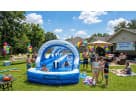 Tobogán acuático doble carril de 32ft en renta en Houston, ideal para fiestas en The Woodlands con diversión para adultos y niños.
