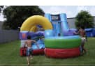 Retro combo water slide rental with 34ft length set up in a Houston backyard, ideal for Pasadena parties with kids playing.
