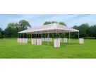Perfect for League City weddings, this 40ft x 100ft frame tent rental in Houston seats up to 660 guests with pink and white