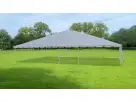 Large gray and white 40ft x 60ft frame tent rental set up on a lawn, ideal for Houston outdoor events and popular in Kingwood.