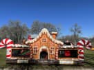 Gingerbread Wonder Playland bounce house rental in Dallas with indoor slide and popups, ideal for Lewisville holiday parties.
