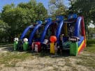 4in1 Sports Challenge interactive bounce house rental in Austin with soccer, basketball, and football panels—ideal for Leander