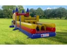 Castle-themed 50ft obstacle course water slide rental in Austin, ideal for Buda birthday parties and events.