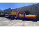 Colorful 50ft obstacle course with dual slides rental setup in Dallas, ideal for Grand Prairie summer parties.