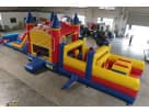 Renta de brincolín Coco Melon de 50ft con tobogán en Dallas, ideal para fiestas en McKinney con área de saltos y obstáculos.