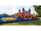 Shopkins obstacle course rental set up in a Dallas park with dual slides and 50ft layout, ideal for Lewisville birthday parties.