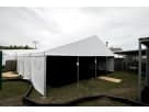 40ft x 50ft drive-through tent rental in Houston with wooden ramp entrance, ideal for large events and Sugar Land parties.