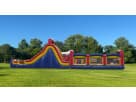 Perfect for Austin birthday parties, this 60ft obstacle course rental features dual-lane slides, rock climbs, and pop-up
