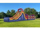 60ft obstacle course rental in Austin with dual slides, pop-ups, and rock climb—perfect for Cedar Park events.