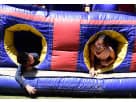 8 Element Obstacle Course rental in Dallas with blue, red, and yellow inflatable design, ideal for large group events in Irving.