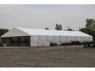 Large white 40ft x 50ft drive-through tent rental in Houston with peaked roof, ideal for events seating up to 350 guests