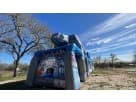 Star Wars obstacle course rental set up in a Houston park—50ft dry or wet slide with climbing area, popular for Conroe birthday