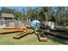 Colorful 9 hole putt putt golf challenge rental in Dallas with vibrant carnival-style tentacle design for Plano parties.
