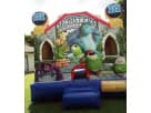 Perfect for Austin parties, this 13x13 Monsters University bounce house rental features a red slide and castle archways