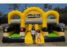 Yellow and black junior obstacle course rental in Austin with rock climb and slide, ideal for Pflugerville birthday parties.