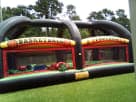Perfect for Austin birthday parties, this dual-sport bounce house rental features eight game options including football
