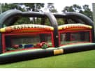 Sports combo bounce house rental in Houston with 8 game options, set up in a residential backyard, ideal for Kingwood parties.
