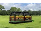 All in One Sports bounce house rental in Austin with eight game options ideal for San Marcos events, set up in a grass park field.
