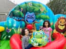 Animal Kingdom toddler bounce house rental in Dallas with colorful owl, frog, and lion characters—ideal for McKinney birthday