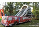 Fire truck bounce house with spiral slide rental in Houston—ideal for birthday parties in The Woodlands.