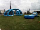 Renta de Water Balloon Battle inflable en Austin, ideal para batallas acuáticas en equipo con piscina incluida.