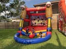 Batters Up Game bounce house rental in Dallas features colorful interactive gaming, ideal for Arlington parties.
