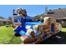 Bear Camp double lane water slide rental in Houston with climbing wall and slide, ideal for Woodlands backyard parties.
