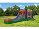 Colorful 3-in-1 bounce house combo with dual water slides in Austin backyard—ideal for Kyle party rentals with wet and dry