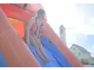 Red and blue dual-lane water slide rental in Austin—3-in-1 combo perfect for backyard parties in Round Rock.