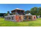Perfect for Fort Worth parties, this army-themed obstacle course rental in Dallas features a dual-lane rock wall and slides.