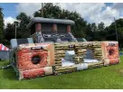 Renta de Black Ops obstacle course en Austin con rock wall y dual slides, ideal para fiestas temáticas en San Marcos.