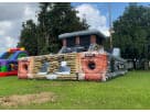 Black Ops two-lane obstacle course rental in Dallas with rock wall, rocking bridge & dual slides—perfect for Mesquite birthday